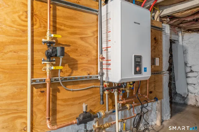 a view of a porch with wooden floor and fence