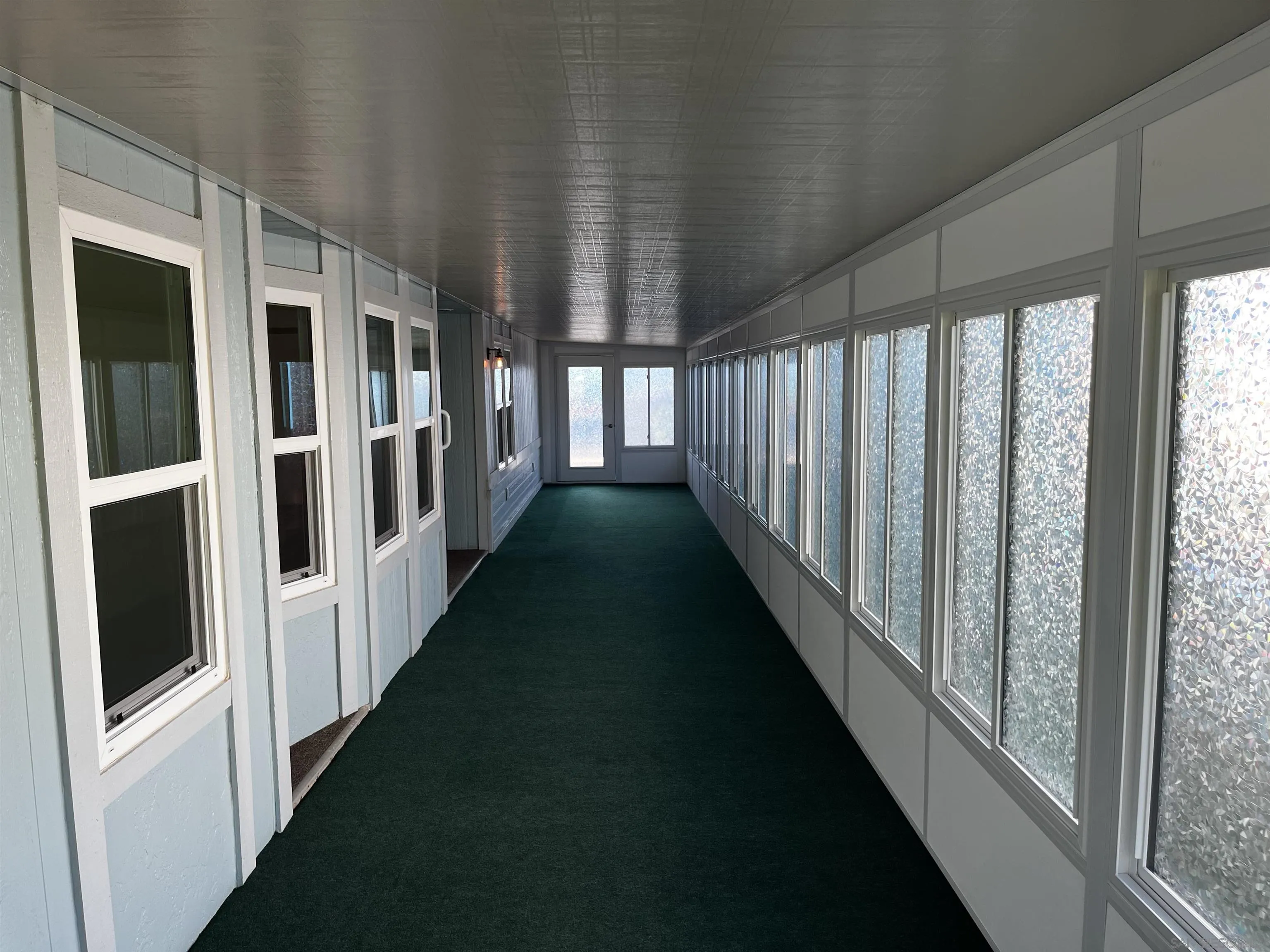 909 Richland Road, Unit 134 San Marcos, CA 92069 - Photo 27 of 44 a view of a porch with wooden floor and stairs