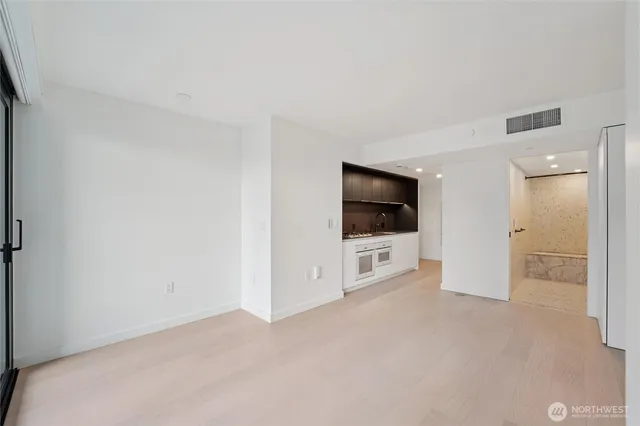 a lobby with furniture and rug