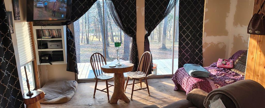 106 Sandy Lane Road Scroggins, TX 75480 - Photo 13 of 27 a view of balcony with furniture