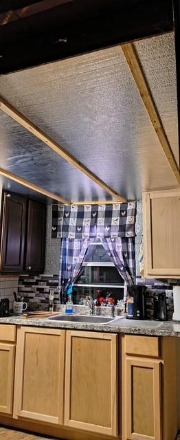 106 Sandy Lane Road Scroggins, TX 75480 - Photo 14 of 27 a kitchen with a stove and a microwave