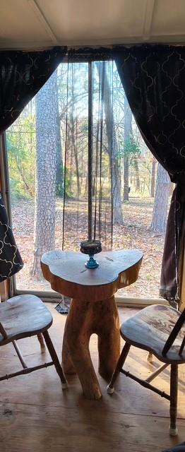 106 Sandy Lane Road Scroggins, TX 75480 - Photo 15 of 27 a view of a dining room with furniture window and outside view