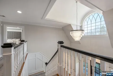 a view of staircase with living area