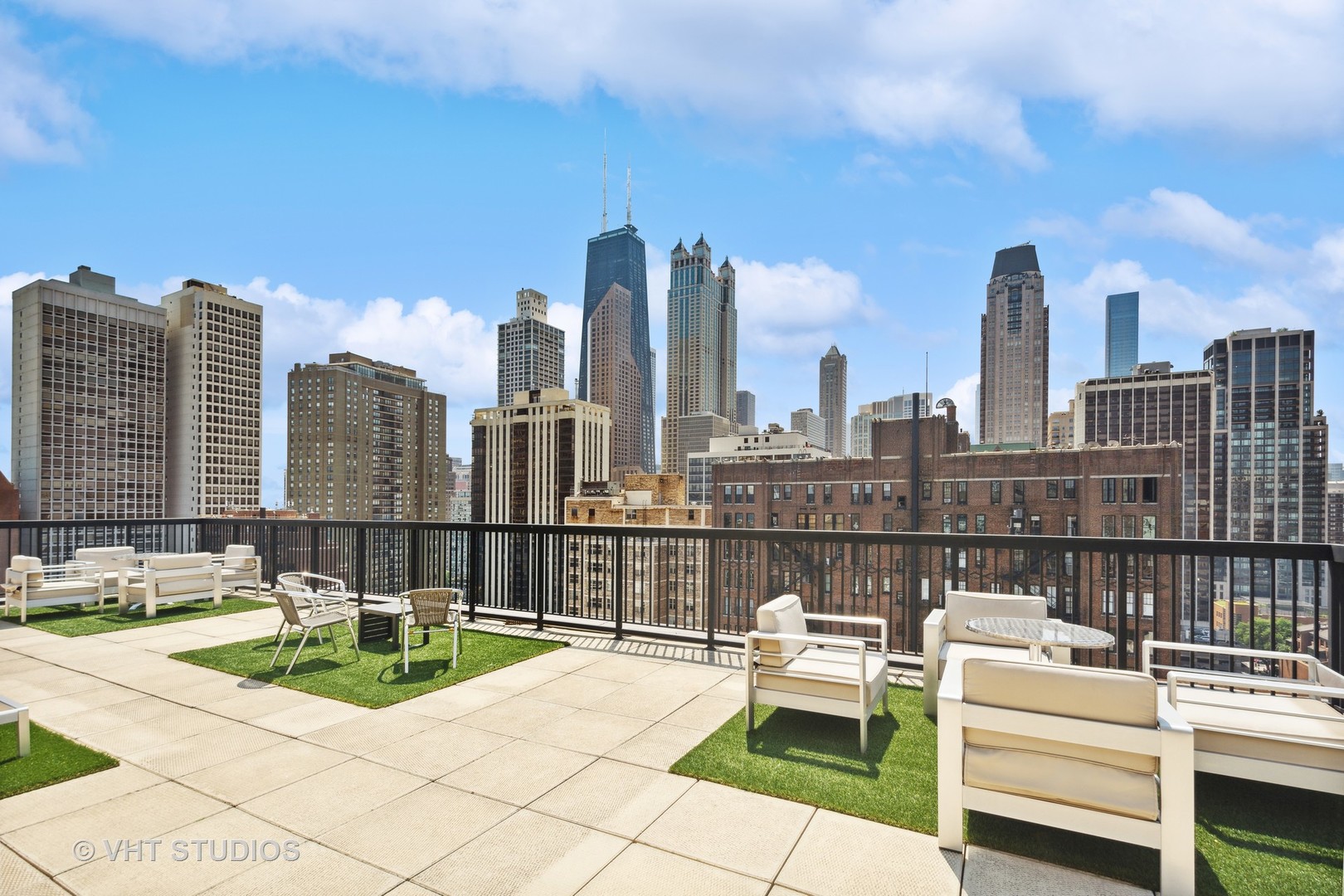 30 East Elm Street, Unit 18A Chicago, IL 60611 - Photo 13 of 16 a view of a city with tall buildings