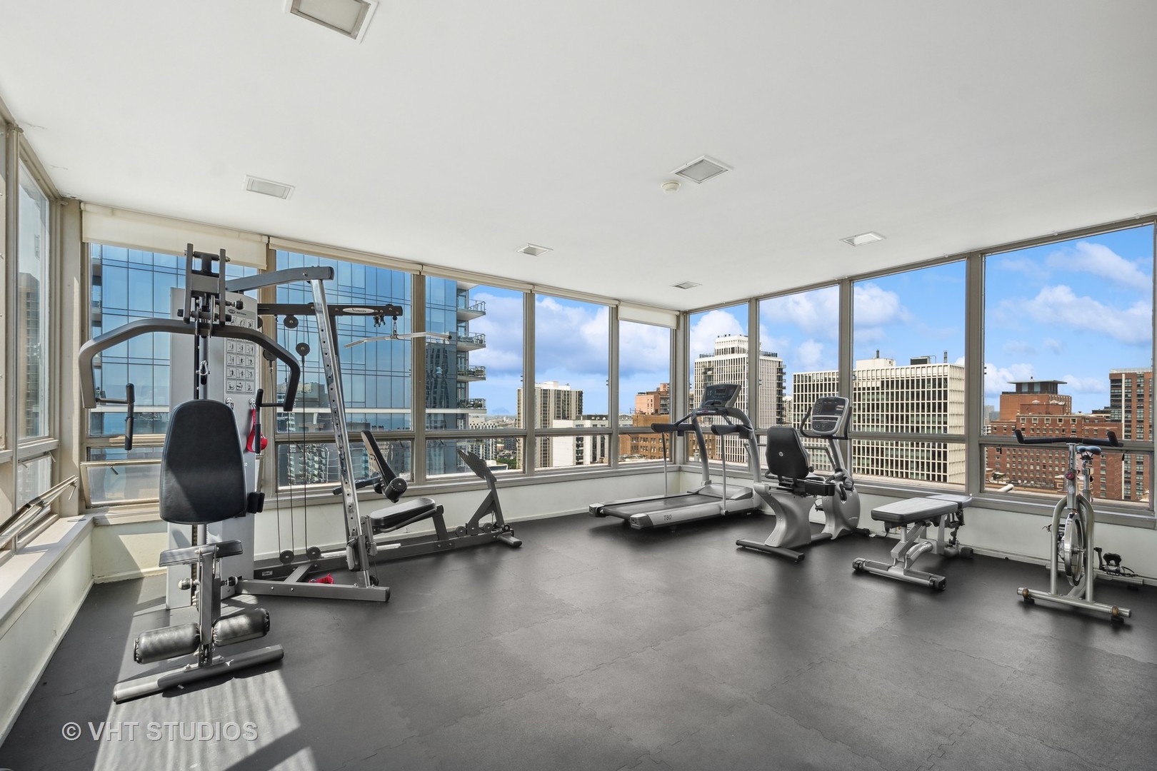 30 East Elm Street, Unit 18A Chicago, IL 60611 - Photo 14 of 16 a view of a room with gym equipment