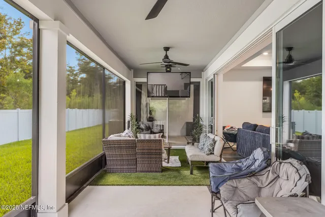 a living room with patio area