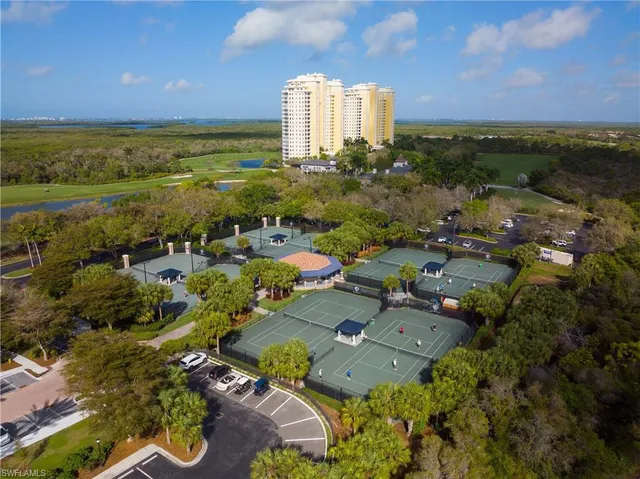 an aerial view of a house with a lake view