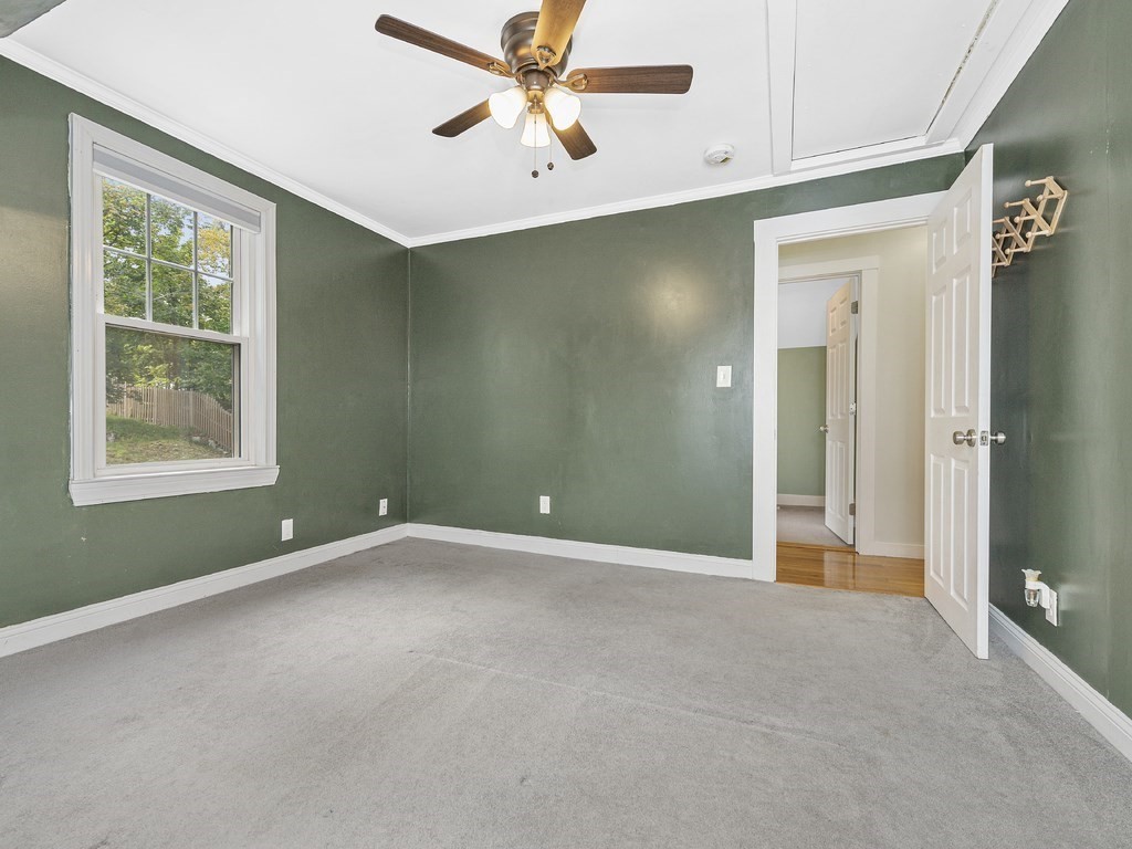 89 Green Street Wakefield, MA 01880 - Photo 15 of 38 a view of an empty room with a window