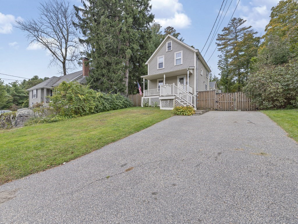 89 Green Street Wakefield, MA 01880 - Photo 27 of 38 a front view of a house with yard