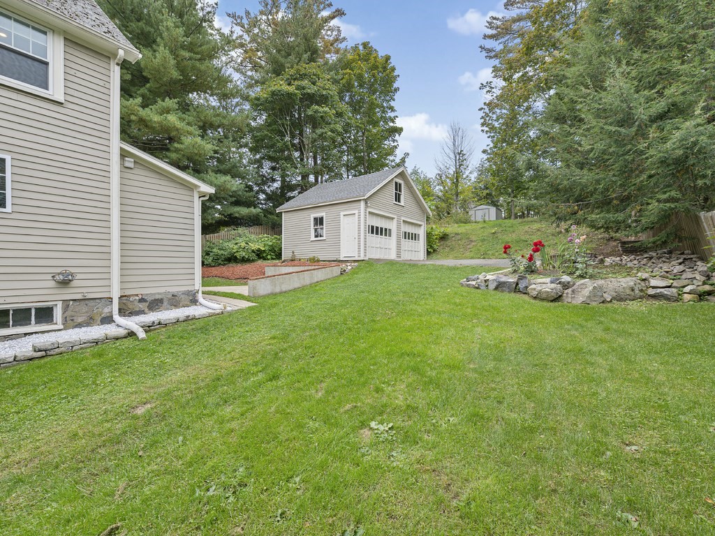 89 Green Street Wakefield, MA 01880 - Photo 31 of 38 a house view with a garden space