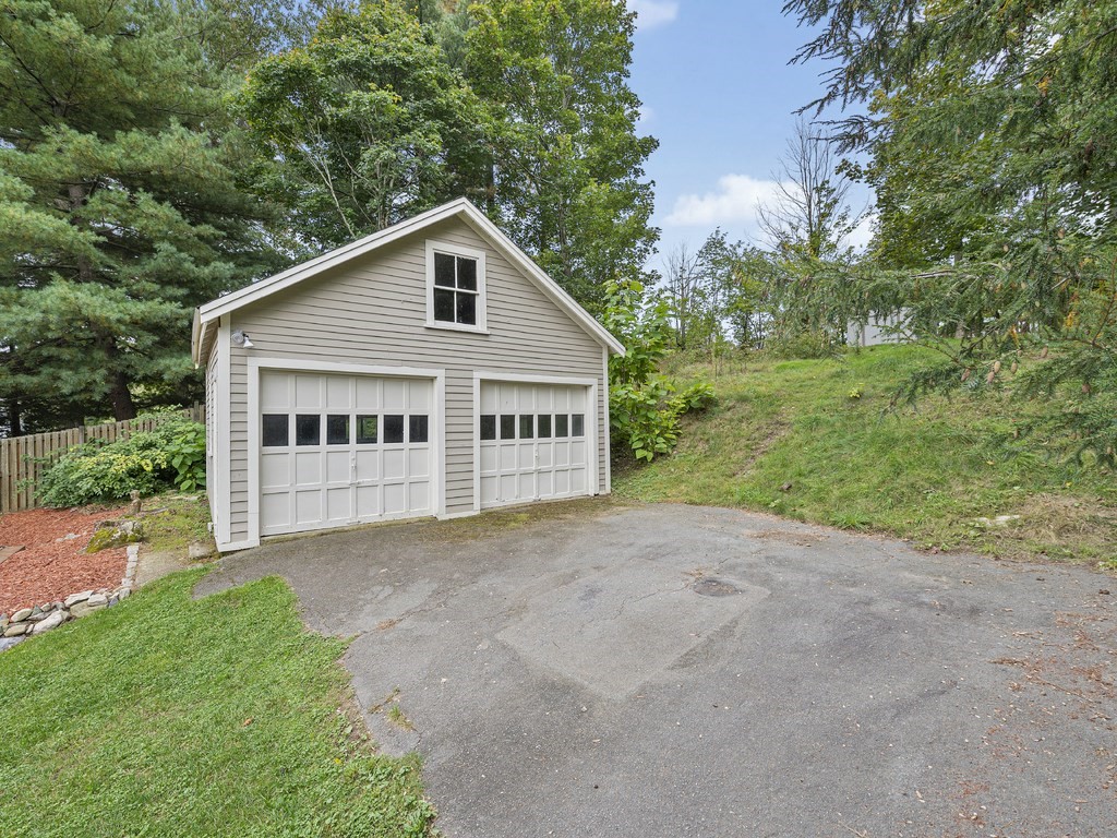 89 Green Street Wakefield, MA 01880 - Photo 32 of 38 a view of a house with a yard