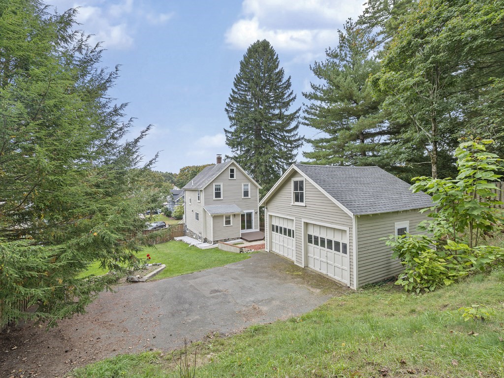 89 Green Street Wakefield, MA 01880 - Photo 33 of 38 a view of a house with a yard and large trees