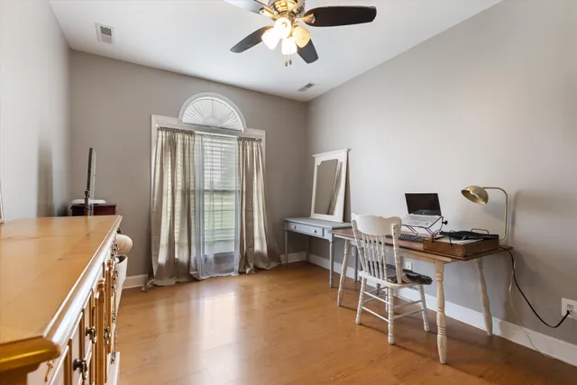 a workspace with chandelier