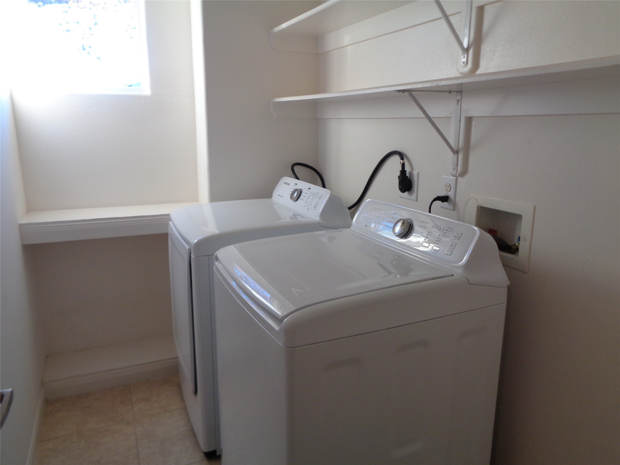 1137 West 24th Street, Unit A Houston, TX 77008 - Photo 22 of 40 Washer and dryer are included. Utility room is on third floor.