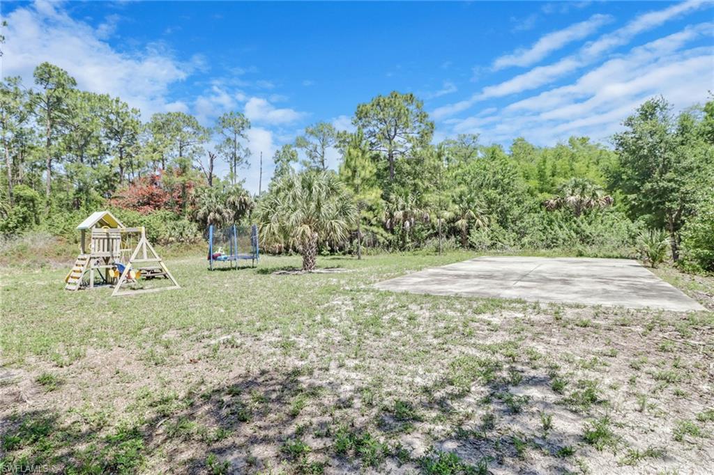 4355 Pine Ridge Road Naples, FL 34119 - Photo 22 of 23 a view of outdoor space with city view