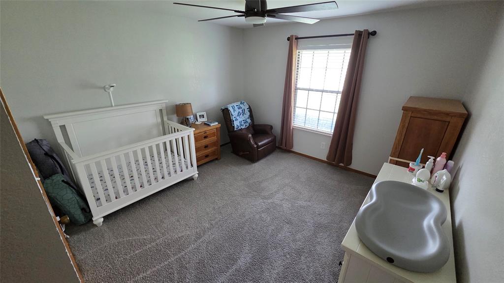 338 Travis Road Decatur, TX 76234 - Photo 15 of 40 a view of livingroom with furniture and tv