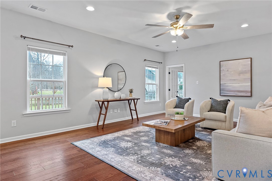 8316 Forge Road Henrico, VA 23228 - Photo 13 of 43 a living room with furniture a table and a window