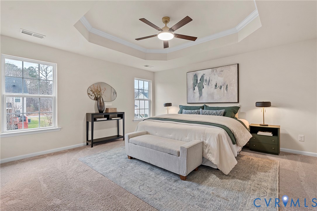 8316 Forge Road Henrico, VA 23228 - Photo 23 of 43 a spacious bedroom with a bed and window