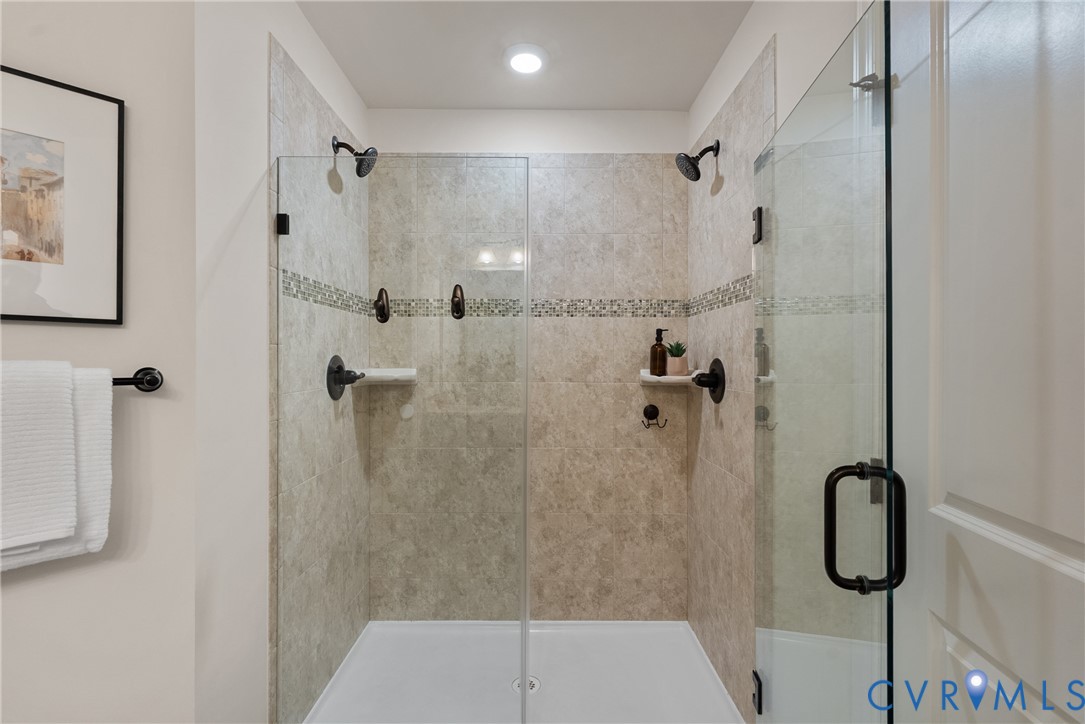 8316 Forge Road Henrico, VA 23228 - Photo 25 of 43 a bathroom with a shower