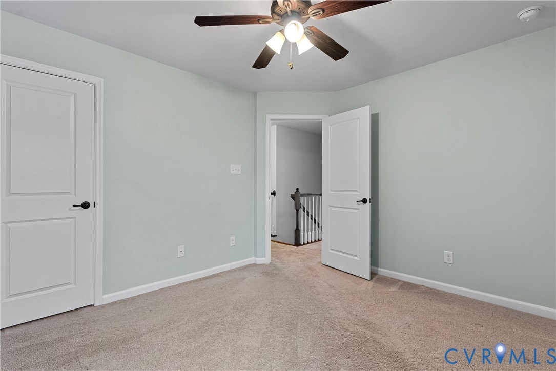 8316 Forge Road Henrico, VA 23228 - Photo 29 of 43 a view of a big room with chandelier fan and closet