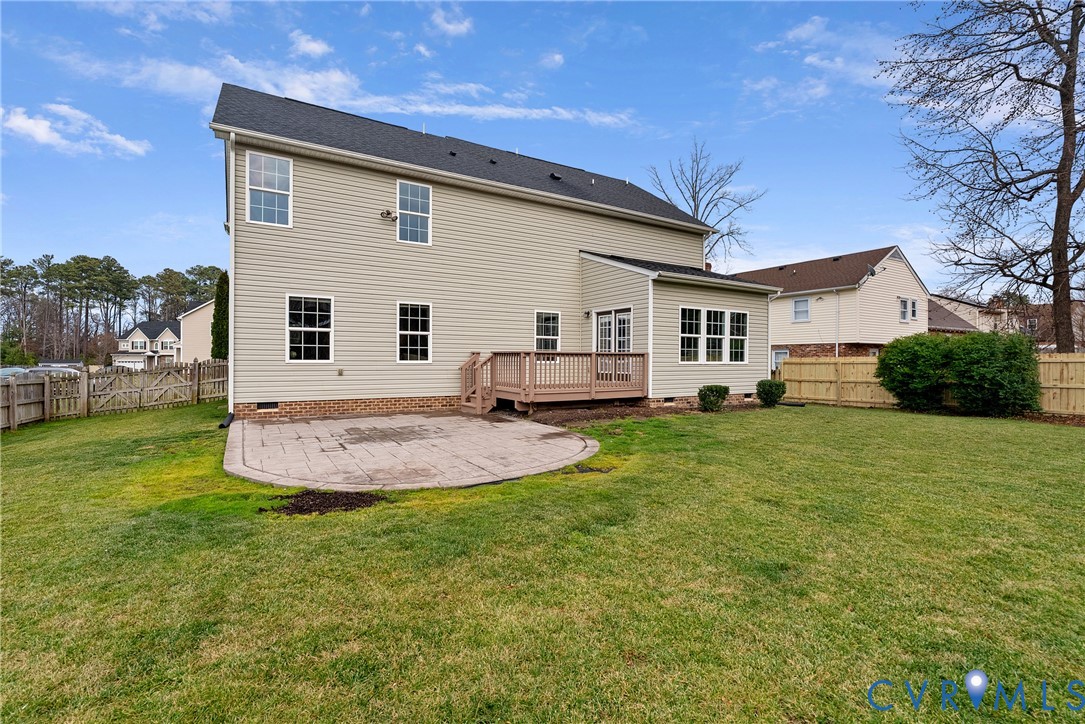 8316 Forge Road Henrico, VA 23228 - Photo 42 of 43 a front view of a house with a yard and garage