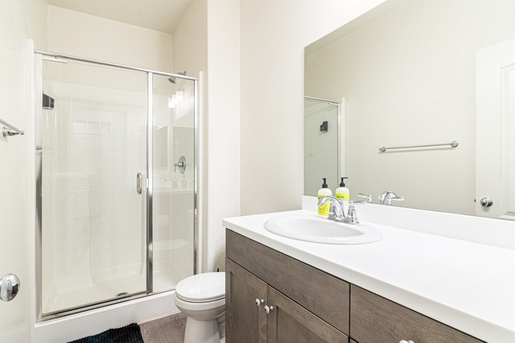35851 Esperia Way Fallbrook, CA 92028 - Photo 14 of 28 a bathroom with a sink toilet and shower