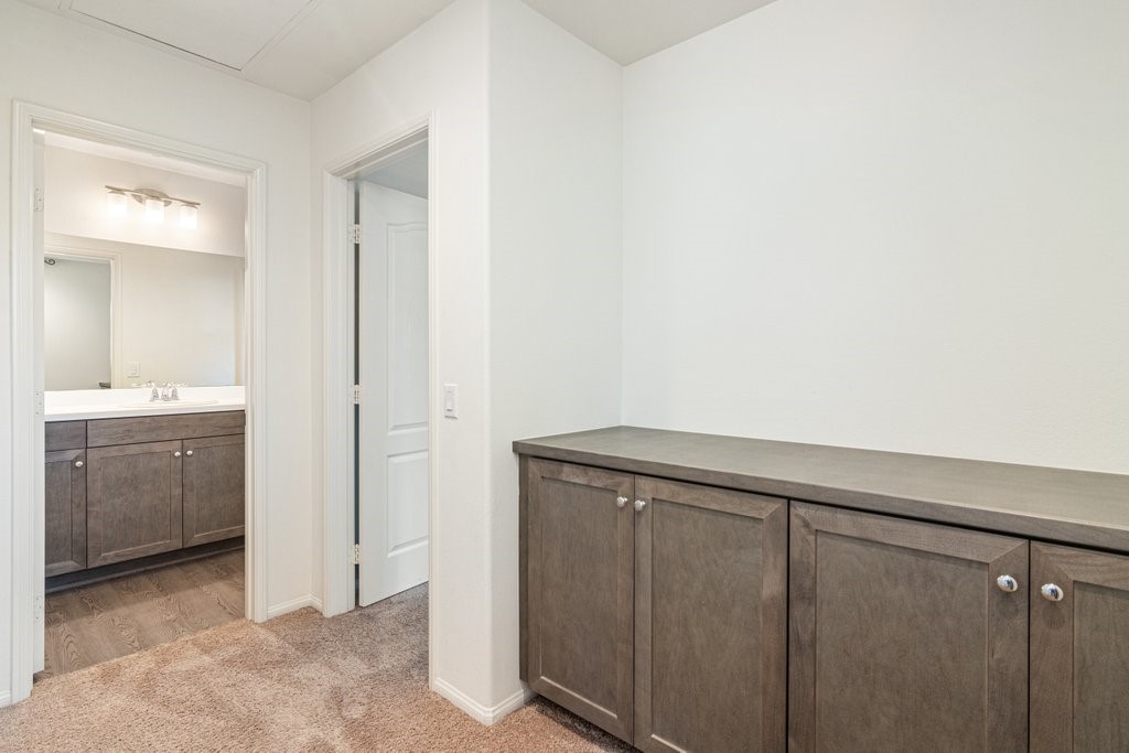 35851 Esperia Way Fallbrook, CA 92028 - Photo 17 of 28 a utility room with cabinets washer and dryer