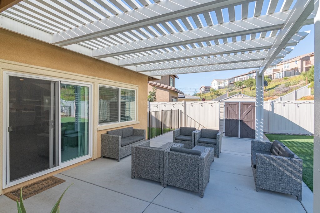 35851 Esperia Way Fallbrook, CA 92028 - Photo 20 of 28 a outdoor living space with patio furniture and garden view