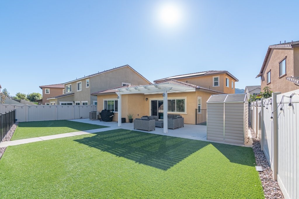 35851 Esperia Way Fallbrook, CA 92028 - Photo 22 of 28 a front view of house with yard and outdoor seating