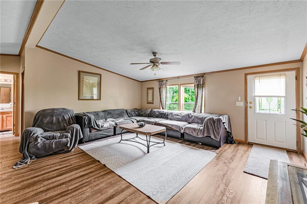3942 Utah Court Export, PA 15632 - Photo 11 of 24 a living room with furniture and a window