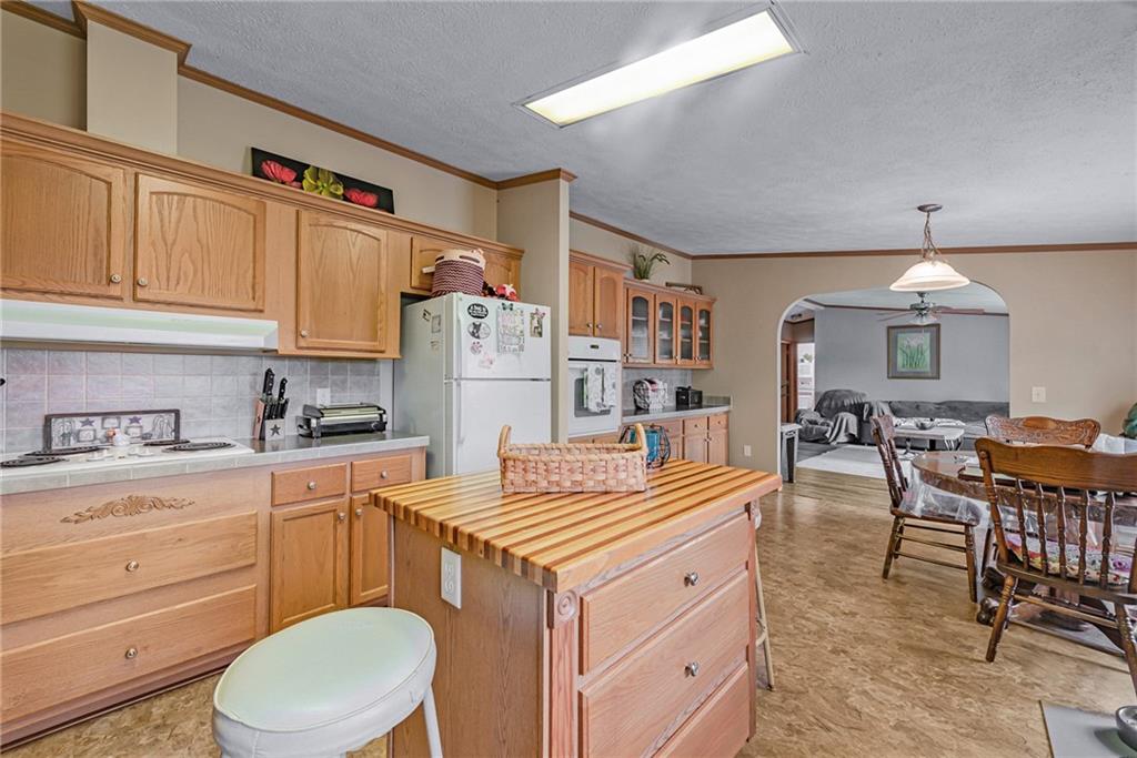 3942 Utah Court Export, PA 15632 - Photo 2 of 24 a kitchen that has a cabinets counter space and appliances