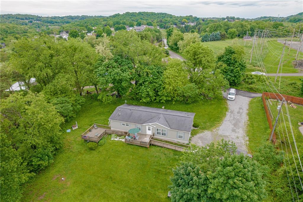 3942 Utah Court Export, PA 15632 - Photo 23 of 24 a view of a lake with a yard