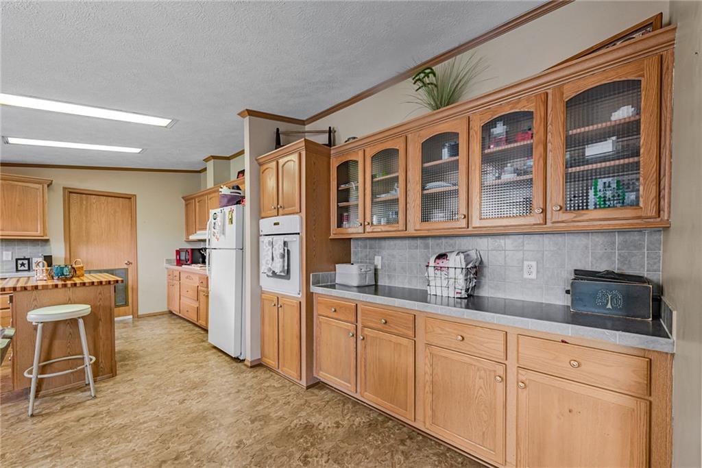 3942 Utah Court Export, PA 15632 - Photo 6 of 24 a kitchen with stainless steel appliances granite countertop a refrigerator and cabinets