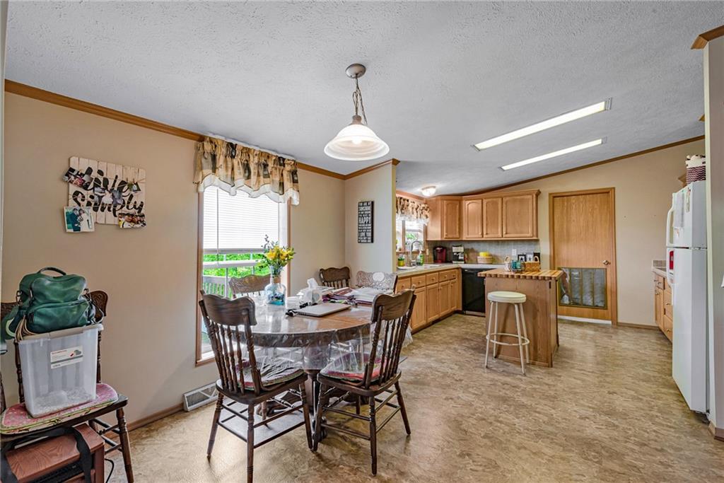 3942 Utah Court Export, PA 15632 - Photo 8 of 24 a dining room with furniture and window