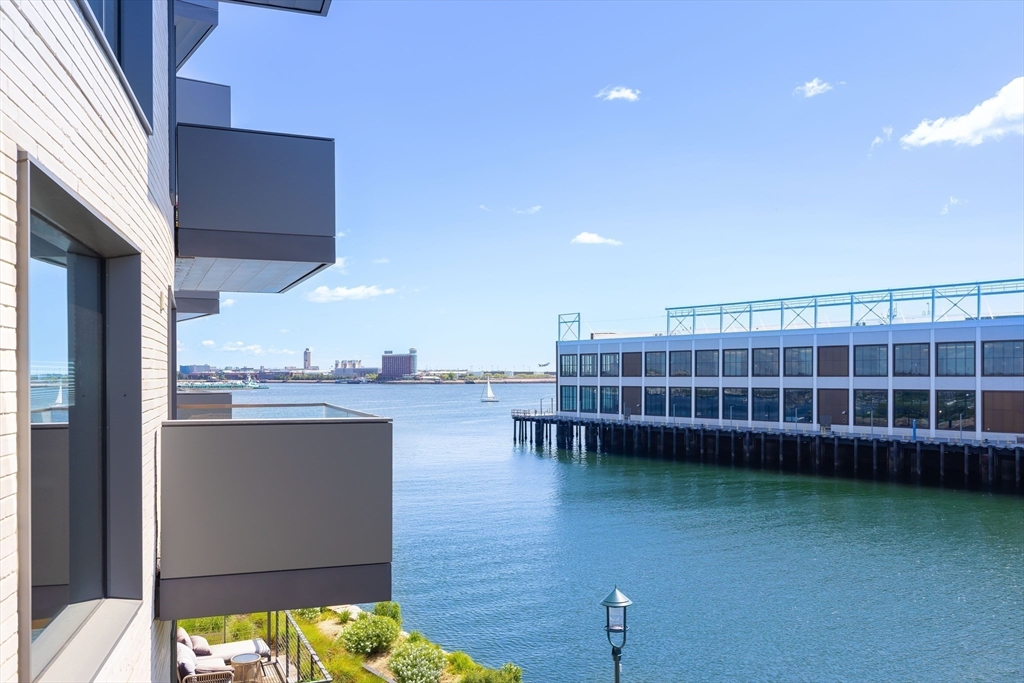 300 Pier 4 Blvd., Unit 3K Boston, MA 02210 - Photo 11 of 24 a view of a balcony with chairs