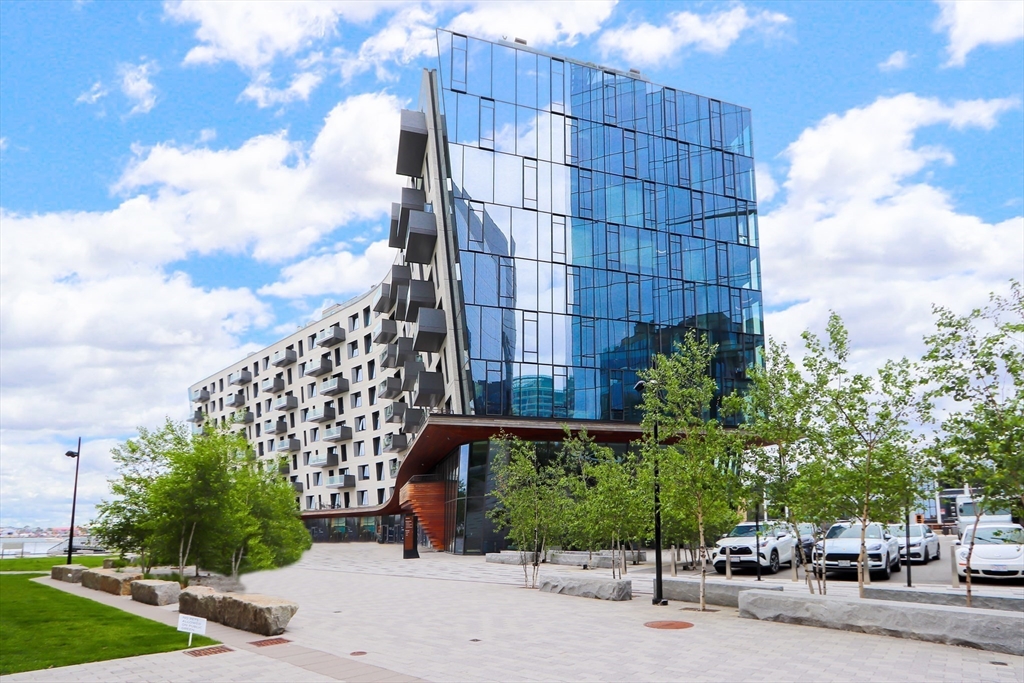 300 Pier 4 Blvd., Unit 3K Boston, MA 02210 - Photo 22 of 24 a car parked in front of a building