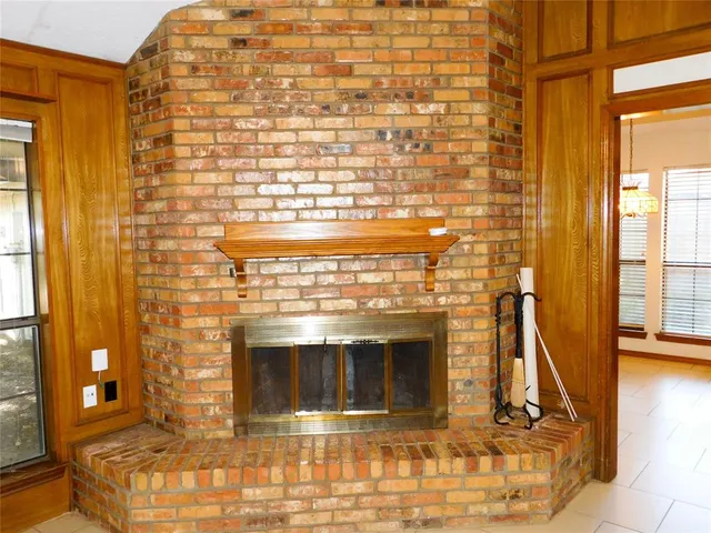a living room with a fireplace