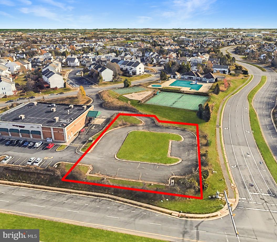 20331 Susan Leslie Drive Ashburn, VA 20147 - Photo 1 of 8 an aerial view of residential houses with outdoor space