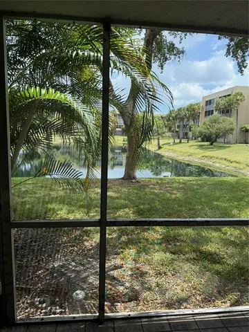 a view of swimming pool from a lake view