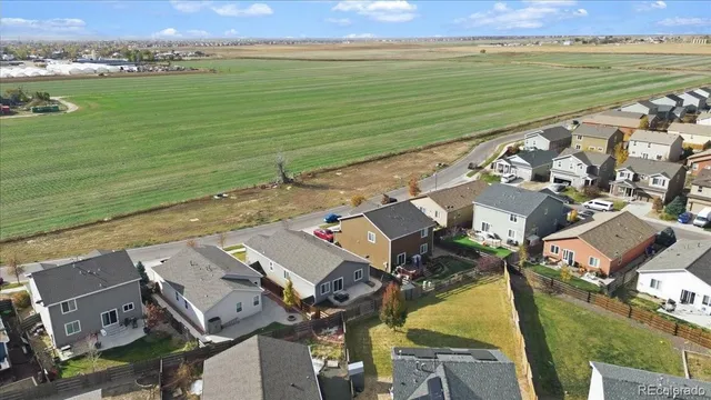 an aerial view of residential house with outdoor space