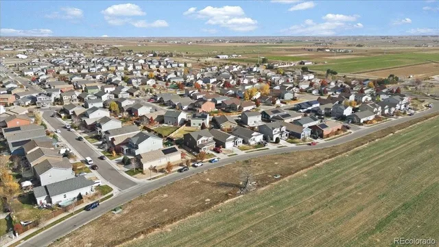 an aerial view of a city with lots of residential buildings