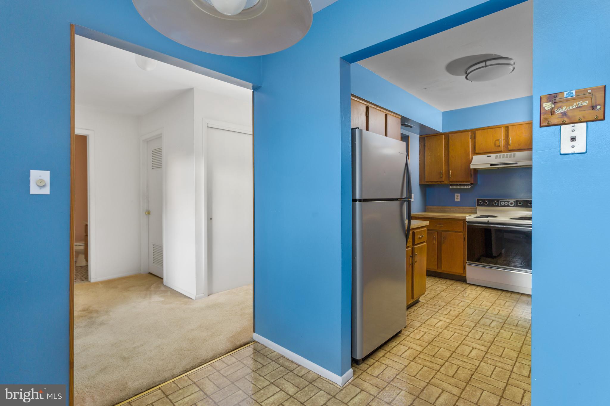 12 Jacob Court Ewing, NJ 08628 - Photo 14 of 45 a kitchen with stainless steel appliances granite countertop a refrigerator and a sink