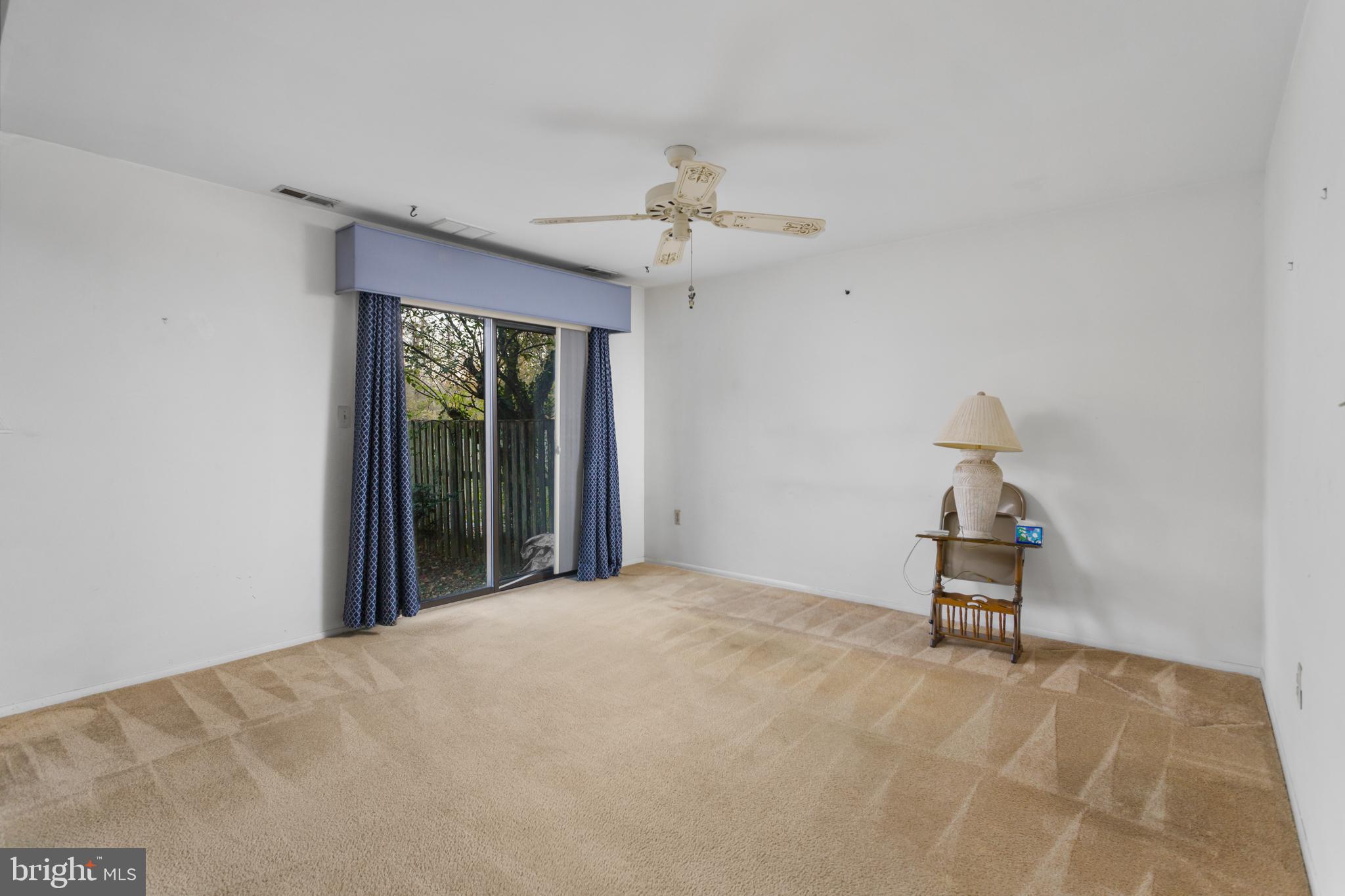 12 Jacob Court Ewing, NJ 08628 - Photo 16 of 45 a bedroom with a bed and a chandelier