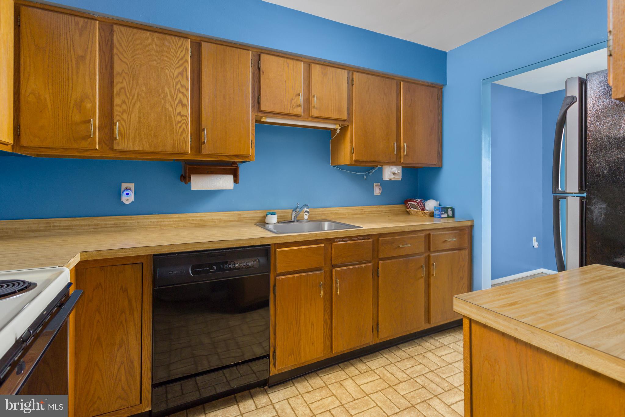 12 Jacob Court Ewing, NJ 08628 - Photo 17 of 45 a kitchen with stainless steel appliances granite countertop a sink stove and refrigerator