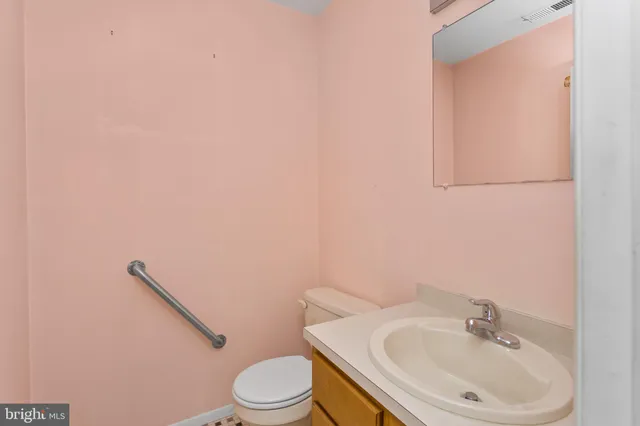 a view of a room with shelf on the wall