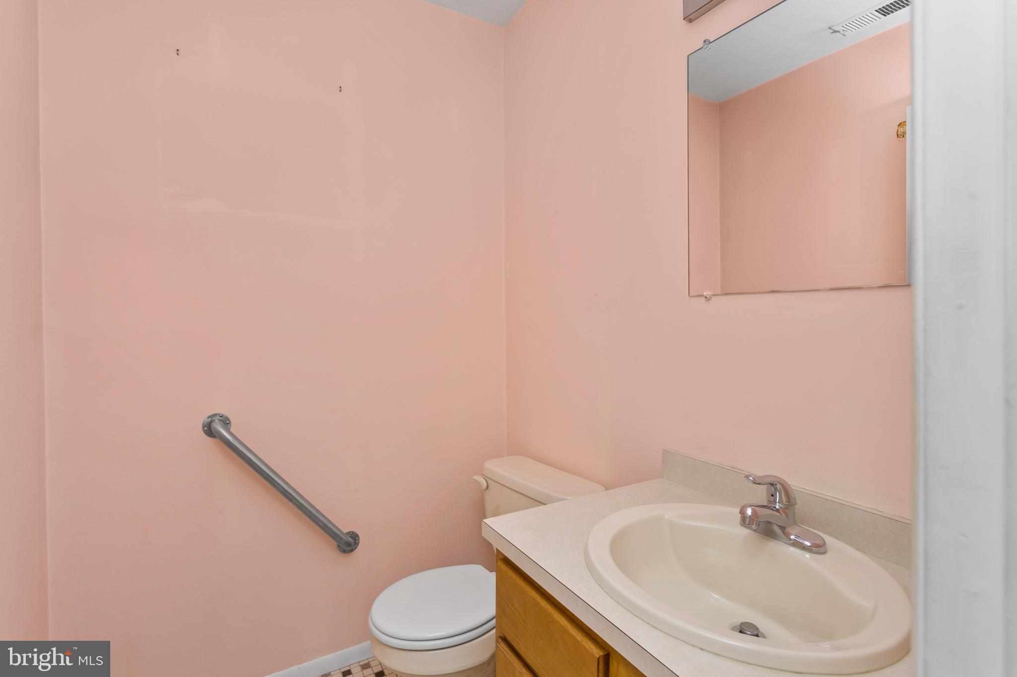 12 Jacob Court Ewing, NJ 08628 - Photo 24 of 45 a white toilet sitting next to a white sink