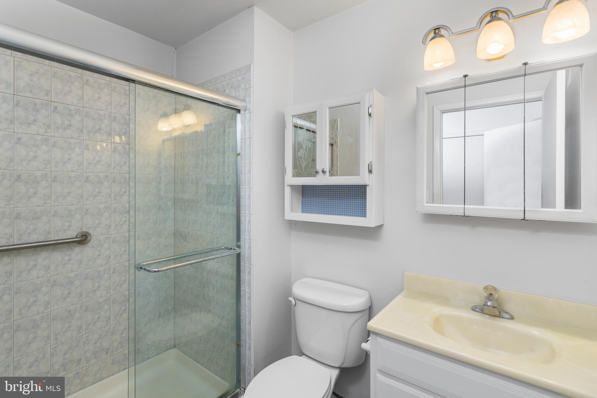 12 Jacob Court Ewing, NJ 08628 - Photo 26 of 45 a bathroom with a toilet sink and shower