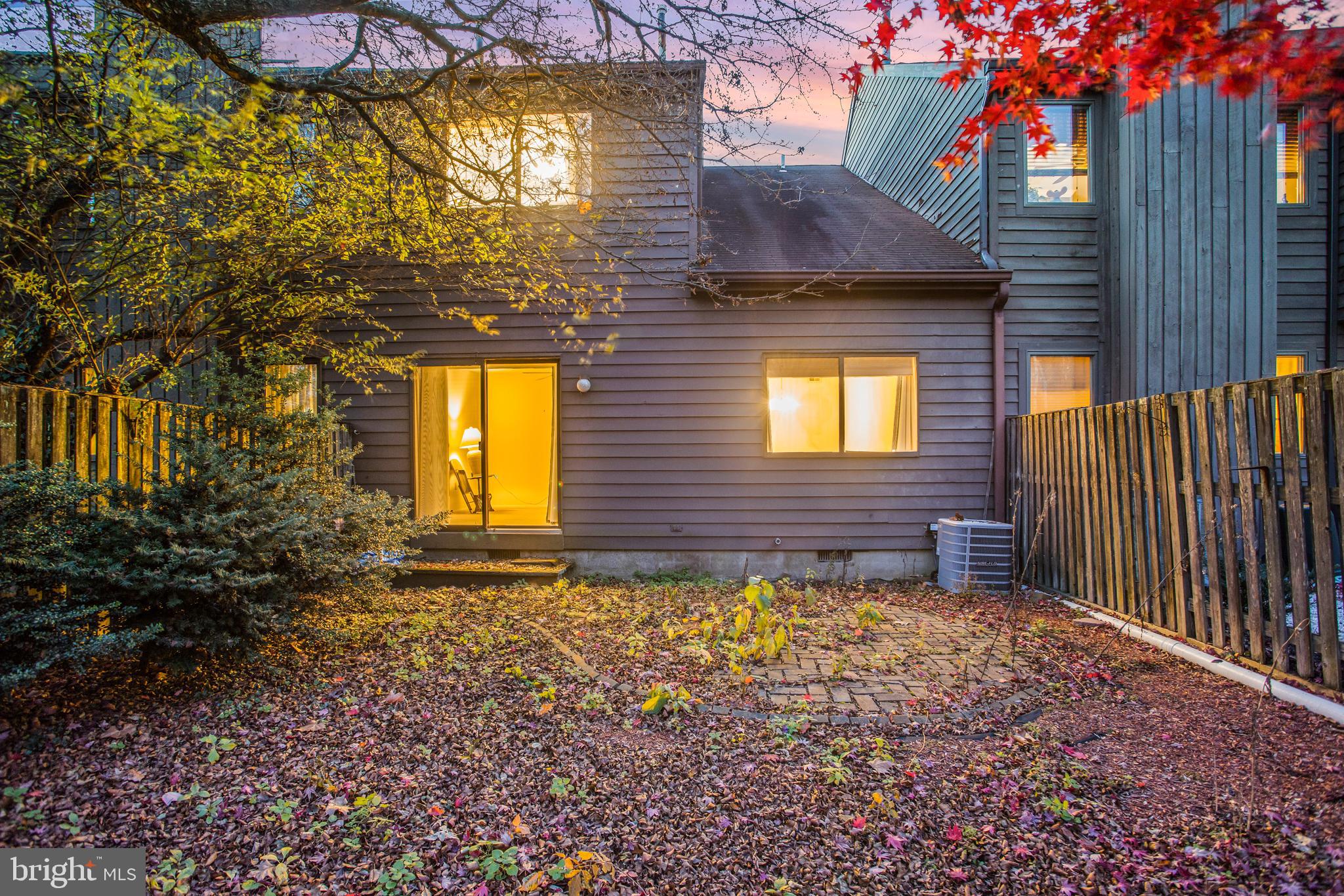 12 Jacob Court Ewing, NJ 08628 - Photo 4 of 45 a view of a house with a large window and wooden fence