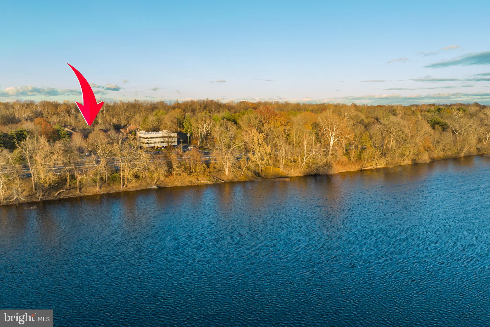 12 Jacob Court Ewing, NJ 08628 - Photo 41 of 45 a view of a room with wooden floor and lake view