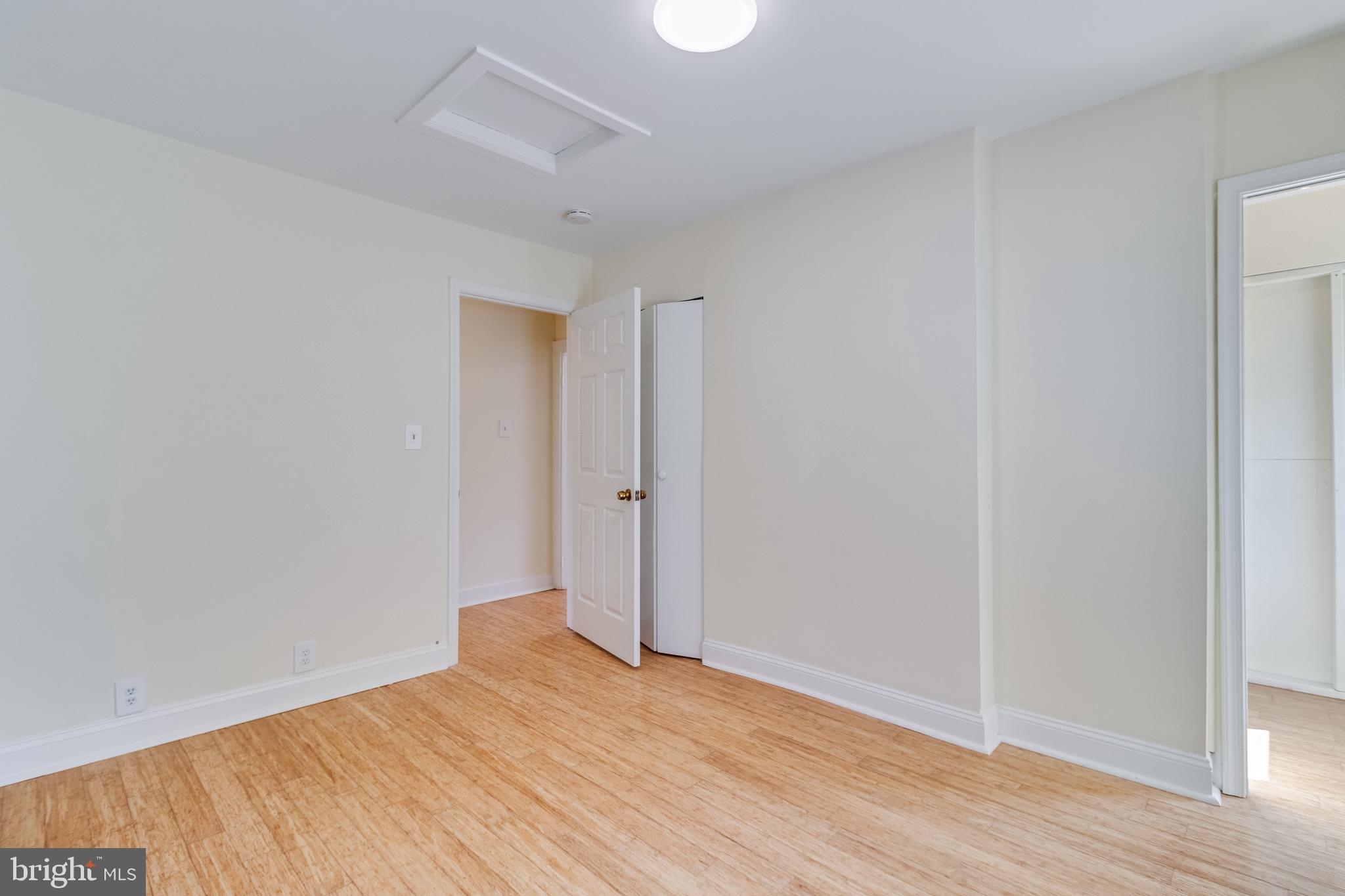 8227 Bayside Road Chesapeake Beach, MD 20732 - Photo 20 of 27 a view of empty room with wooden floor